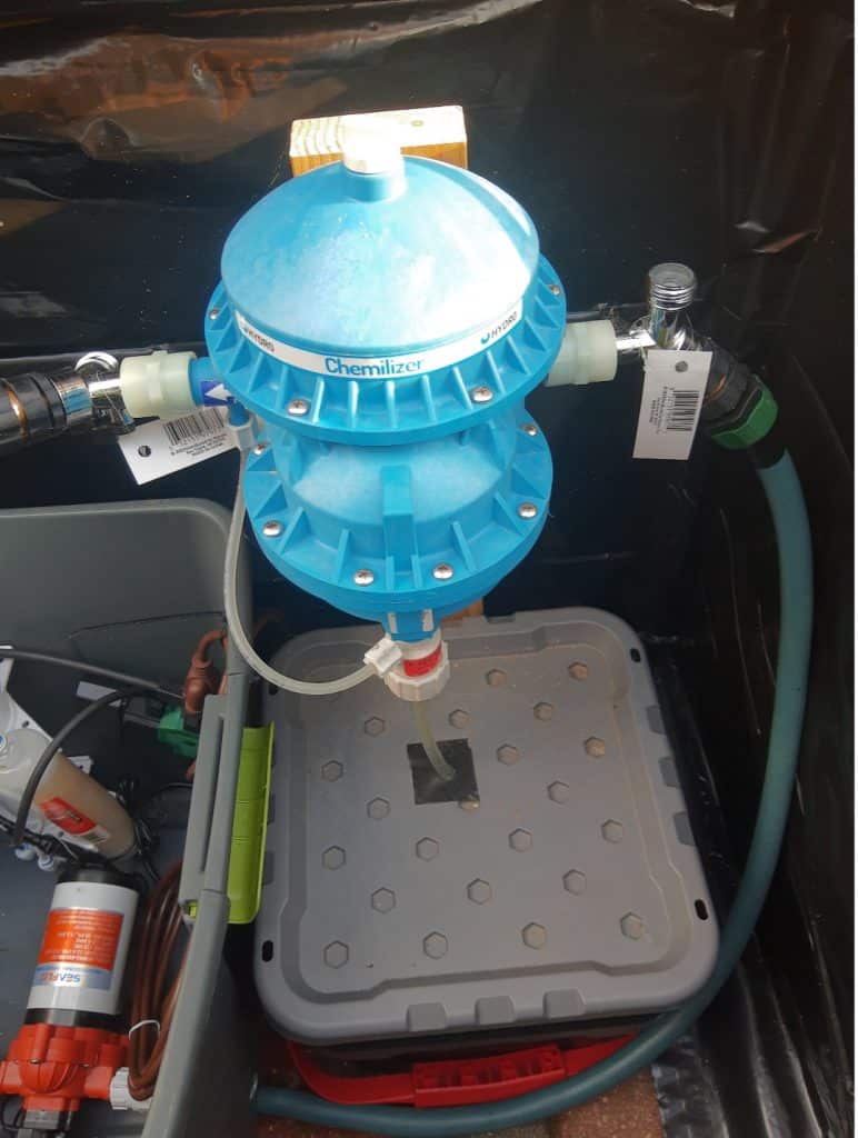 Figure 3. Fertilizer injector. Water comes from the in-demand pump and gets mixed with Dyna-Gro.